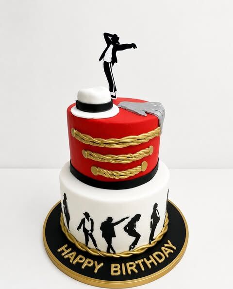 Torta de dos pisos roja y blanca con siluetas bailando